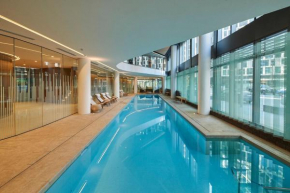 High Rise on Collins with Free Parking Pool Gym